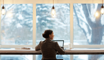 Student studying with a light bulb above her head