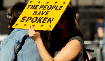 People holding poster