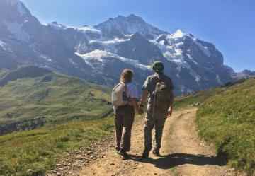 People facing a mountain